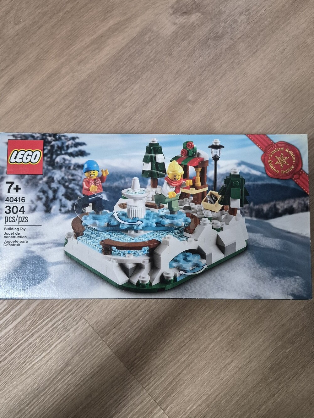 LEGO Winter Ice Rink Scene with Blue, White, Green, Yellow and Red Accents